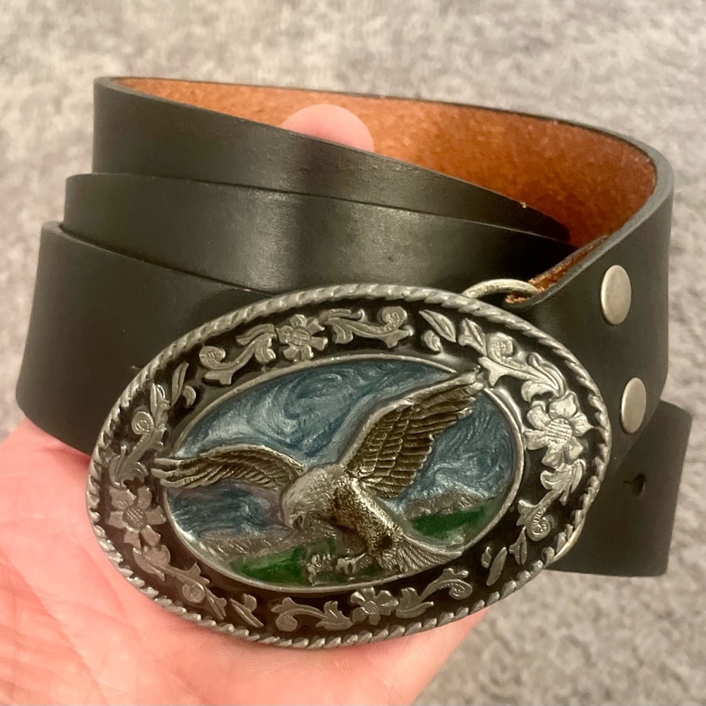 Large Guess leather belt with hand crafted metal belt buckle.